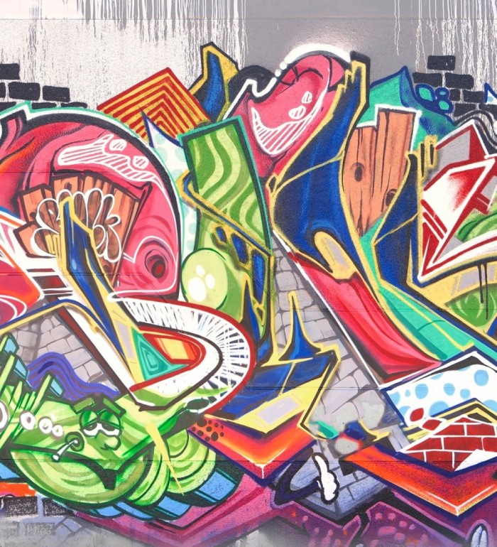 Papel pintado mural de arte urbano con graffitis abstractos y colores vibrantes - Basquiat Graffiti 684769